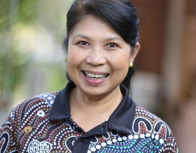 A headshot of Gilda in a NAIDOC 2021 shirt